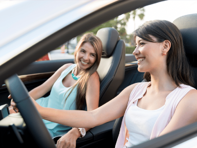Teen driving with mom