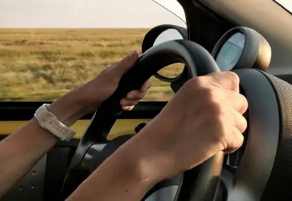 inline-hands-on-wheel